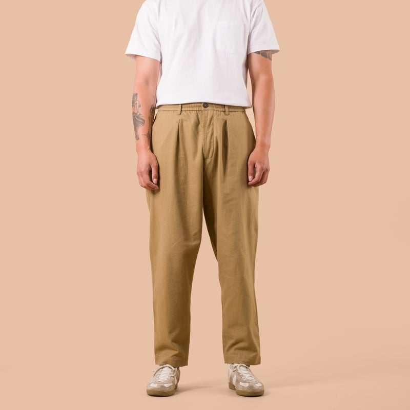 flaneurs worn front UNIVERSAL WORKS Brushed Moleskin Pleated Track Pant Sand