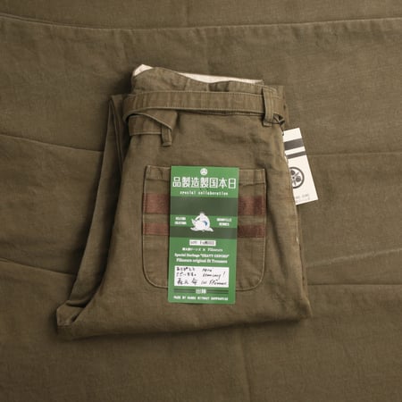 MOMOTARO X FLÂNEURS / FnM003 "Heavy Oxford" Original Fit Trousers in OD Green