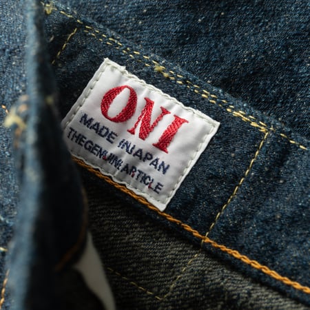 Image-Flâneurs_ONI DENIM / 288CCD-GOLV 15oz Regular Straight "Greyish Olive" Crushed Concrete Denim_Detail-etiquette Image-Flâneurs_ONI DENIM / 288CCD-GOLV 15oz Regular Straight "Greyish Olive" Crushed Concrete Denim_Detail-etiquette